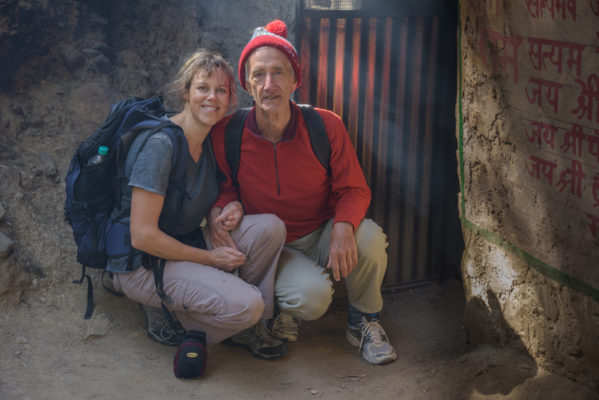 David Godman and his wife Miri Albahari squatting by sadhu cave in Gangotri